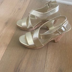 Franco Sarto gold leather cork platform shoes